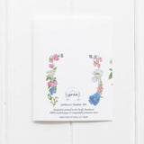 The back of the Transgender coming out card also features colorful watercolor flower illustrations matching the trans pride flag colors.
