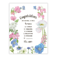 A greeting card with watercolor illustrations of colorful flowers matching the trans pride flag surround a coming out message. The text reads "Congratulations on having a new trans child/sibling/cousin/relative/friend. It's Me."