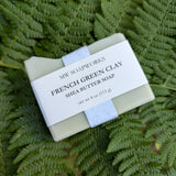 A four ounce bar of French Green Clay Shea Butter Soap from MW Soapworks sits on top of Pacific NW ferns.