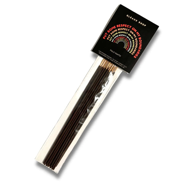A package of incense sticks sits against a white background with the words "Put Some Respect On My Boundaries" written across a label on the top in repeating block letters in a rainbow shape.