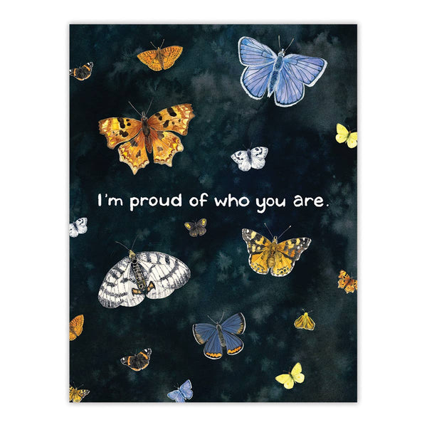 A greeting card with various colorful butterflies against a dark background, and the text 'I'm proud of who you are' sits against a white background.