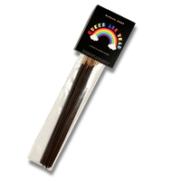 A package of incense sticks with a label that reads "Queer All Year" and has a happy rainbow graphic