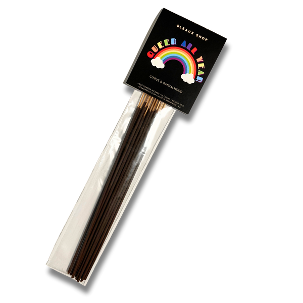 A package of incense sticks with a label that reads "Queer All Year" and has a happy rainbow graphic